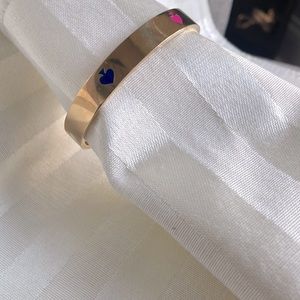 Kate Spade bangle bracelet, gold with multicolor spades